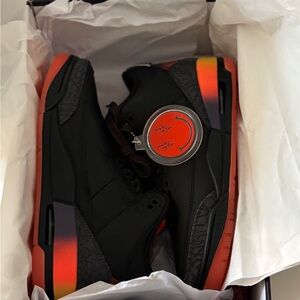 Nike Black and Orange High-Top Sneakers